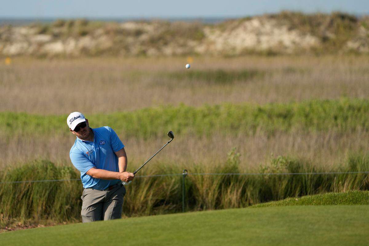 George Cotzee, of South Africa, chips up to the on the ninth green during a practice round at the PGA Championship golf tournament on the Ocean Course Tuesday, May 18, 2021, in Kiawah Island, S.C. (AP Photo/David J. Phillip)