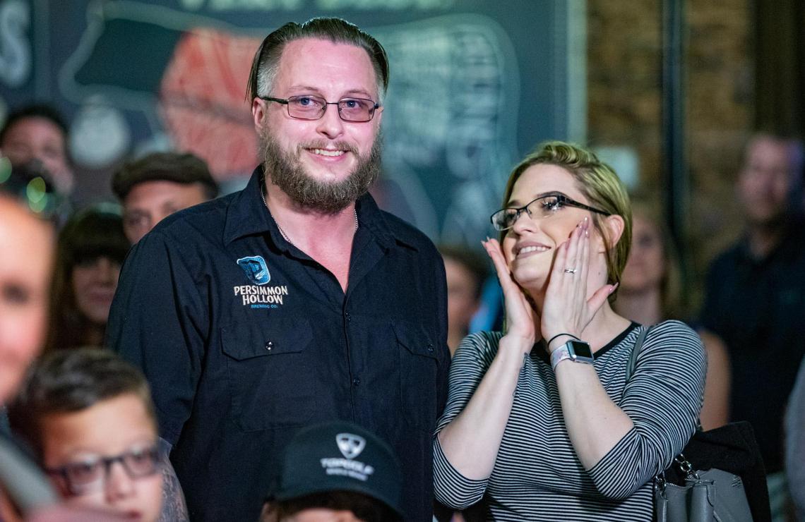 Myrtle Beach veteran and USMC Corporal Daniel Dobay celebrates with wife Kasey after being awarded a mortgage-free-home by PulteGroup’s Building Homes for Heroes at The Grumpy Monk. In 2011, Dobay was injured in Afghanistan & given a purple heart.