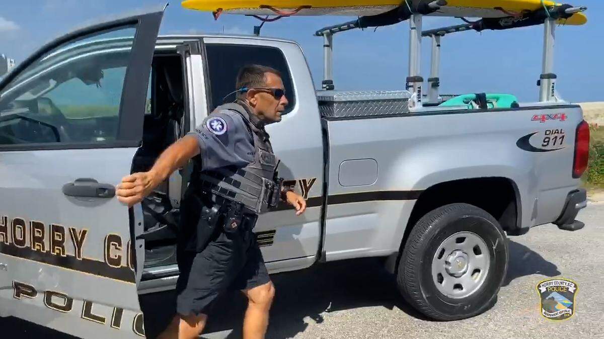 A frame grab of a video produced by Horry County Police Department shows Officer Julian “Duke” Brown. Brown ran over and killed a Myrtle Beach beachgoer in June 2024.