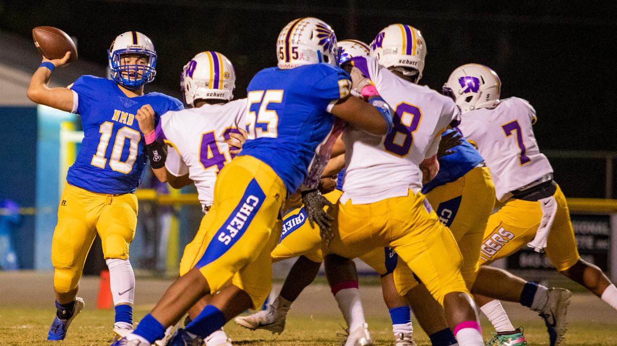North Myrtle Beach Chiefs sophomore quarterback Cam Freeman throws against the Wilson Tigers Friday night in Little River.
