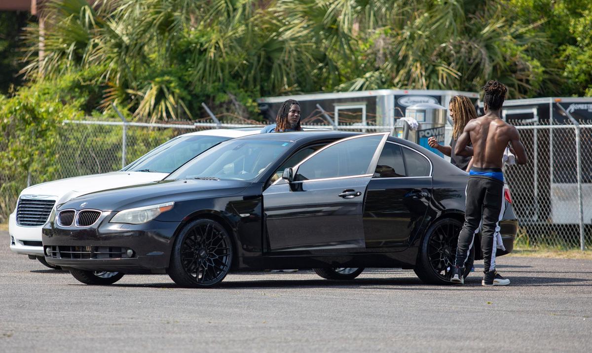 Bikefest attendees wipe down their cars at the Sandlapper Car Wash Saturday afternoon in Myrtle Beach.