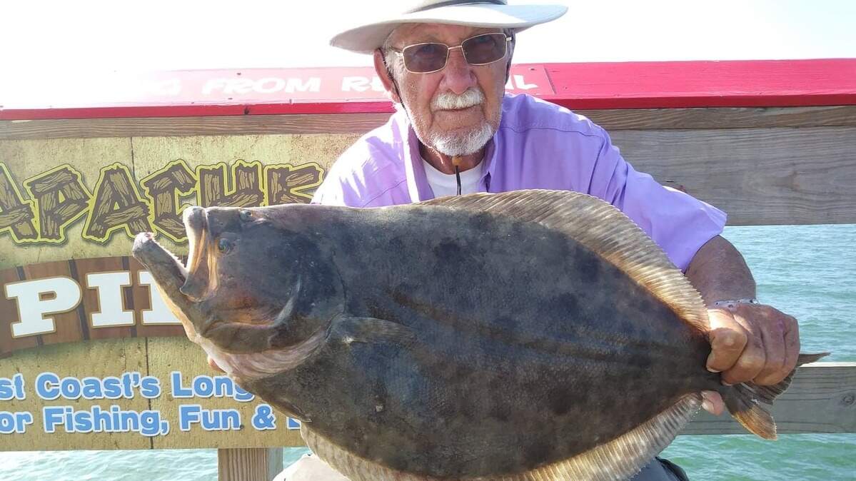 Angler Homer Carder with a 6.5-pound flounder caught recently from Apache Pier.