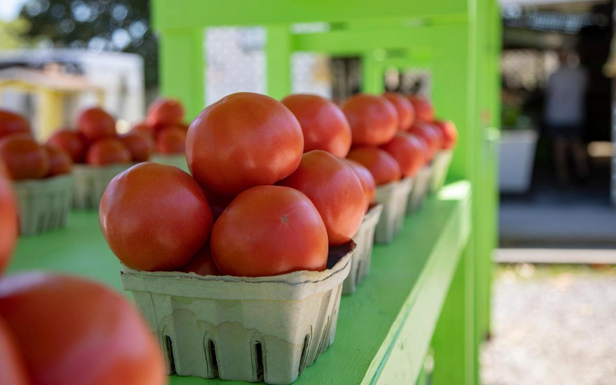 Tomatoes sit on racks outside of Myrtle Beach Produce on 29th Avenue North in Myrtle Beach.