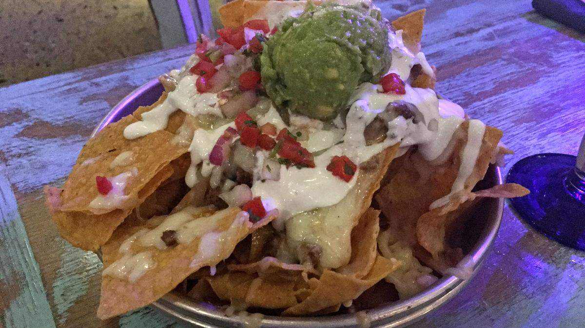 Taco Mundo Americano Nachos at Taco Mundo Kitchen y Cantina.