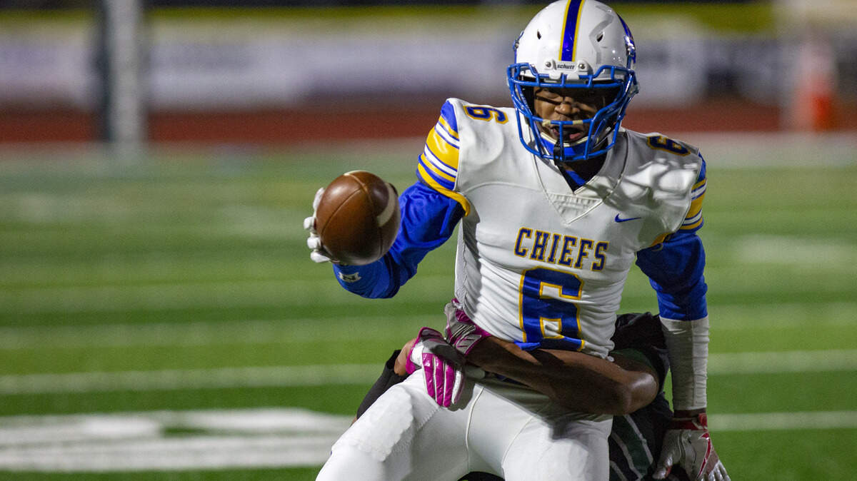 North Myrtle Beach senior tight end Davion Gore catches a pass from senior quarterback Cason McClendon against the Myrtle Beach Seahawks on Thursday night at Doug Shaw Memorial Stadium. Myrtle Beach won 17-14.