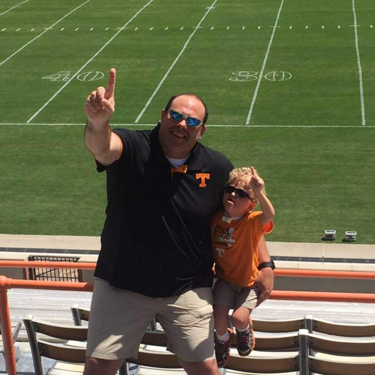 Patrick Rhodes and his son Jack, who was 3 years old when the photo was taken at Neyland Stadium.