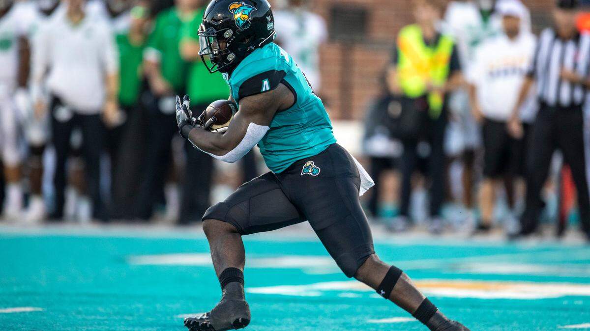 Coastal Carolina Running Back C.J. Beasley with the football. CCU ran over the Old Dominion Monarchs with 278 yards rushing in there win making them bowl eligible. Photo taken October, 28, 2023.