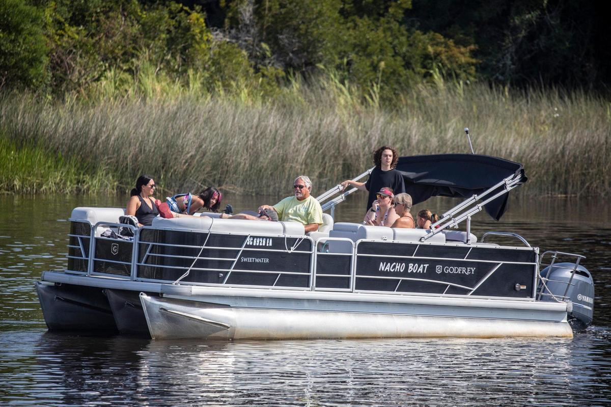 Members of Freedom Boat club load up at Harbourgate marina for a day on the water in North Myrtle Beach. The boat club, which maintains a fleet of vessels in three Myrtle Beach area locations, has experienced record membership growth due in part to low dealer inventories and post-pandemic interest in boating. Aug. 3, 2022.