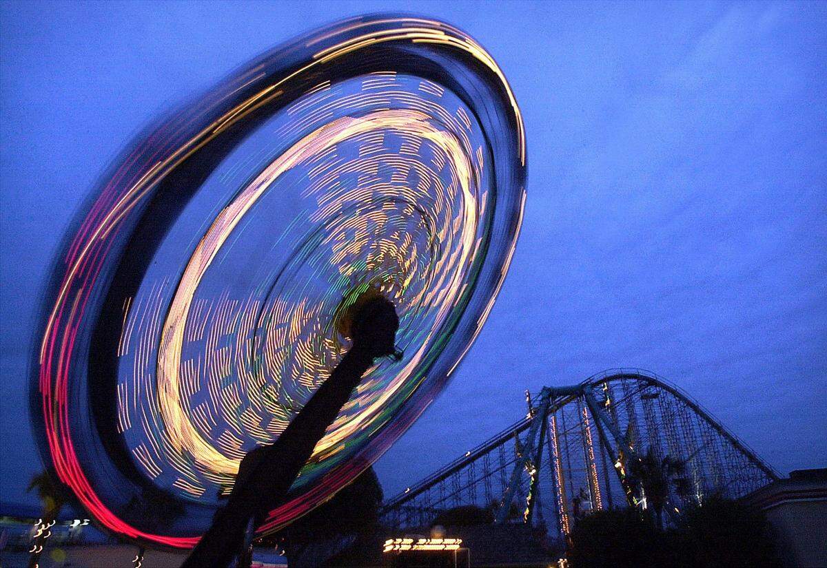 The Enterprise spins over the Myrtle Beach Pavilion Amusement Park on Friday, March 14, 2003. The park opened for the season on Friday. Published Sept. 27, 2016.