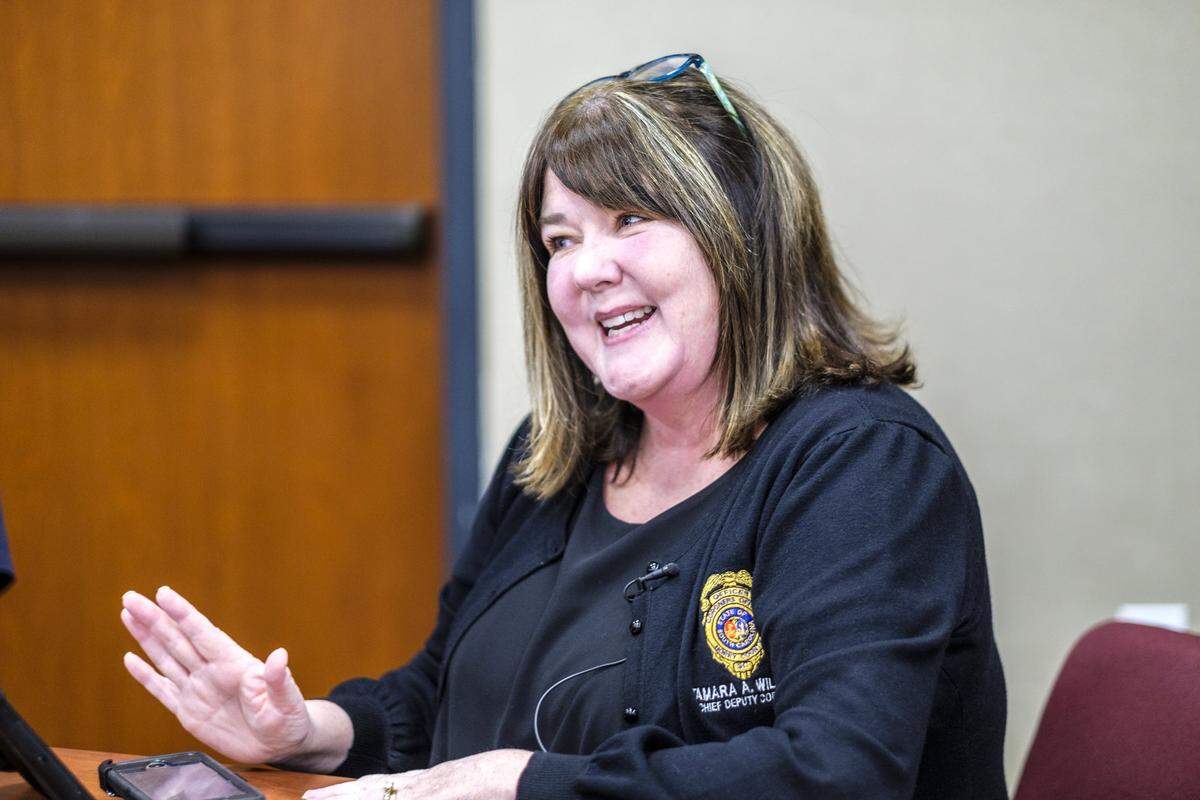 Dena Chasten, a relative of Malquan Hawkins, meets with Pawleys Island Chief of Police Michael Fanning, and Horry County Chief Deputy coroner Tamara Willard to talk about the genealogical research that resulted in identifying Horry County's longest standing cold case involving the deceased. Malquan Tyreek Hawkins, 22 at the time of his death, was found drowned in a resort pool in 2016 leaving no clue of his identity. The Horry County coroners have been searching for answers to his life and identity since. Nov. 12, 2025.