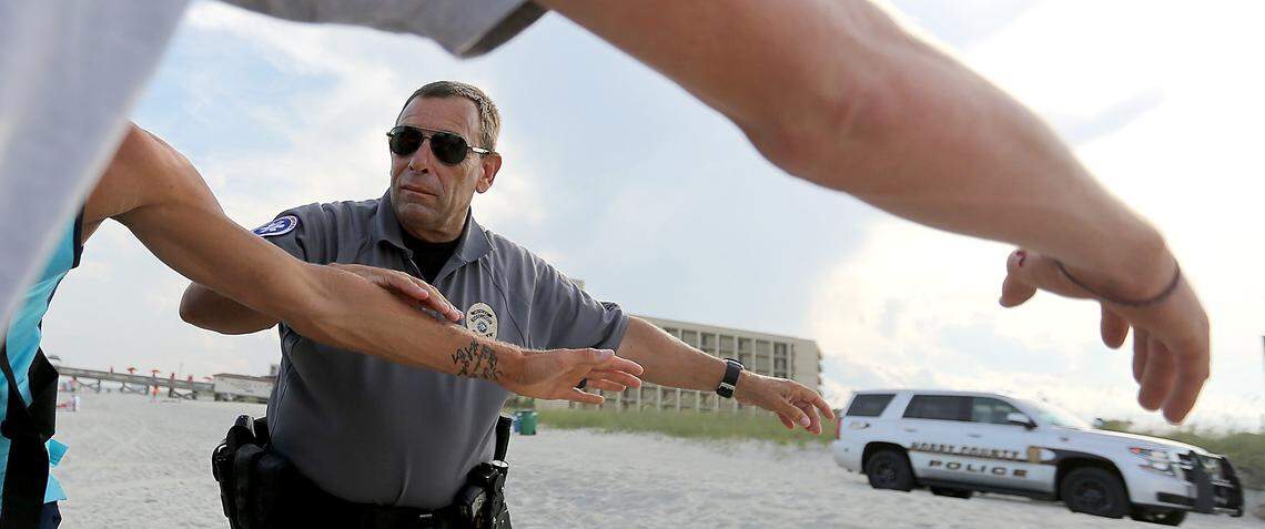 Julian “Duke” Brown demonstrates rescue technique on Tuesday, July 19, 2016. Brown was driving the Horry County Police truck that hit a beachgoer in 2024.
