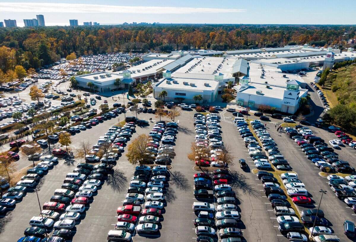 Holiday shoppers search for parking spots at Tanger Outlets in North Myrtle Beach on Black Friday after the Thanksgiving holiday.