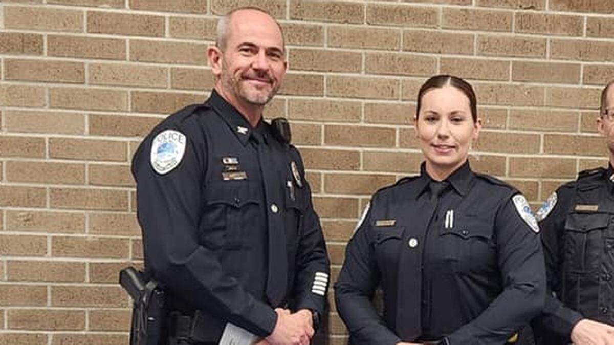Former Surfside Beach Police Officer Samantha Mabon poses for a picture with Chief Kenneth Hofmann after graduating from the S.C. Criminal Justice Academy.