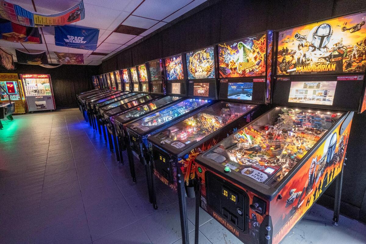 The Player 1UP arcade bar has opened in Murrells Inlet featuring classic coin operated arcade games that date back to the early 1980s, pinball machines, billiards tables, air hockey, Skee-Ball, NBA Hoops, racing games and shooting games. It also has a rooftop bar. May 13, 2022.