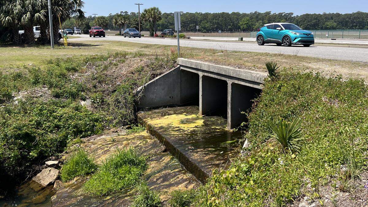 The Midway canal runs from the Myrtle Beach International Airport to the ocean outfall at 29th Avenue South in Myrtle Beach, SC. It carries storm water out to sea. April 23, 2026.
