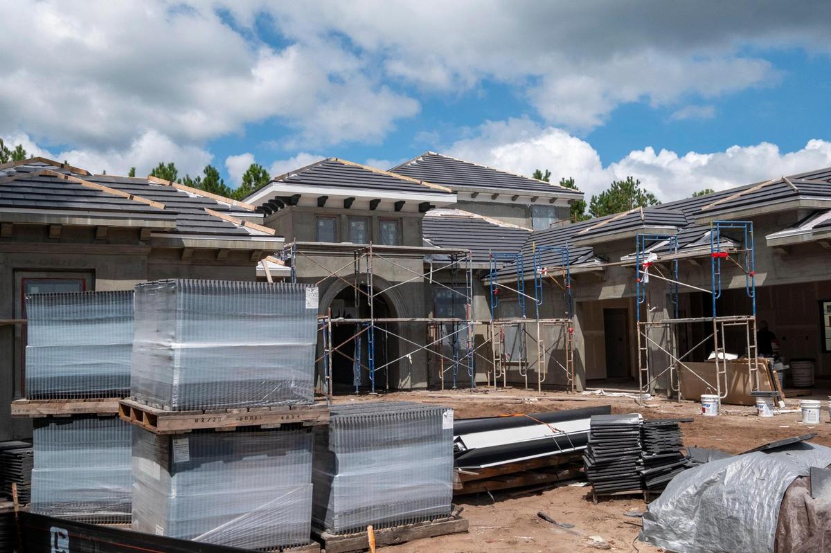 Brandon and Erin Coakley are being sued after beginning construction on a home in Grande Dunes due to their choice of roofing materials which does not match the other homes in their specific neighborhood. September 14, 2020.