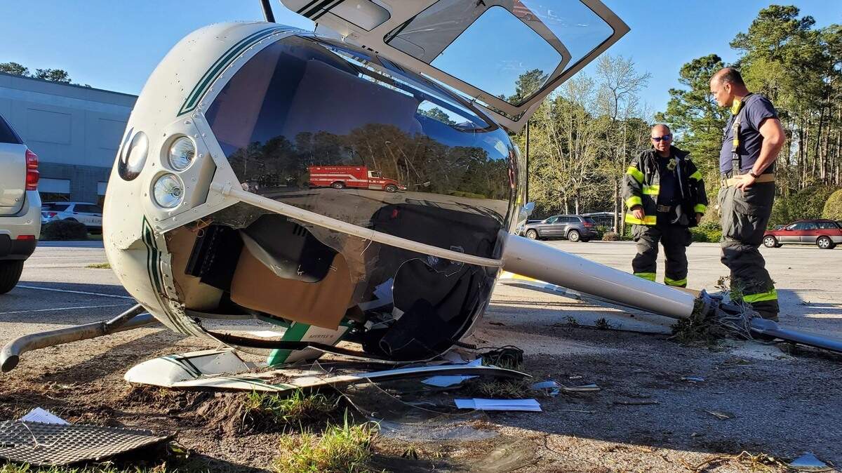 A helicopter with four people on board crashed in a parking lot off of 17th Ave South in Myrtle Beach on Saturday. Police said passengers had minor injuries. March 26, 2022.