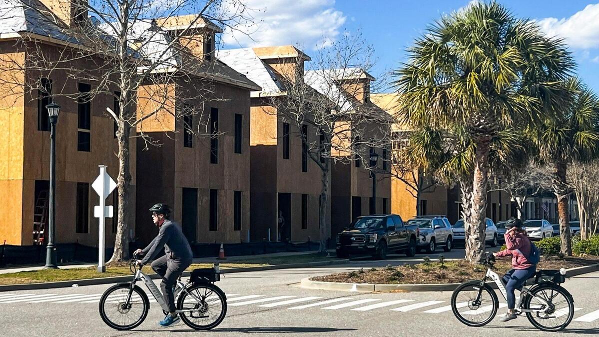 Construction continues with the final phase of townhomes being built at Market View at Market Common along Howard Street in Myrtle Beach, S.C. Feb. 15, 2024.
