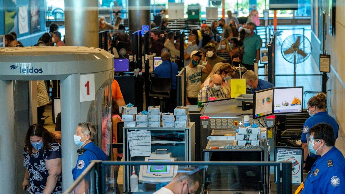 Travelers make their way a TSA checkpoint at Myrtle Beach International Airport (MYR.) Oct. 14, 2021.