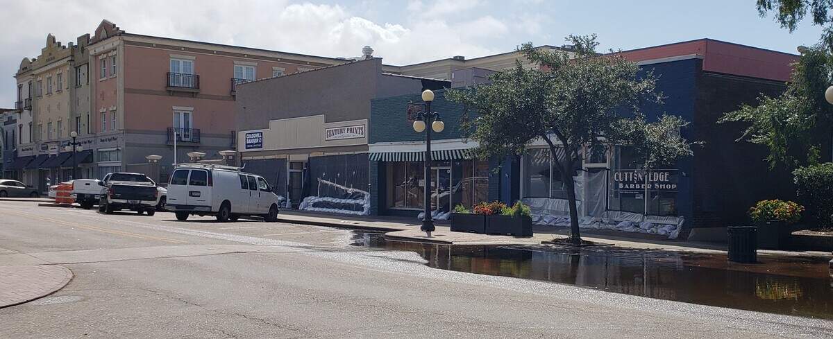 Sandbags line business on Front Street in downtown Georgetown ahead of flooding.