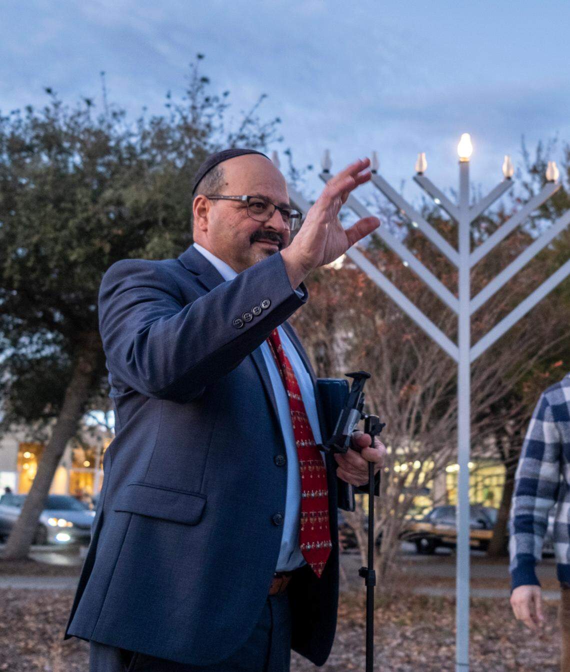 About fifty people attended The Temple of Shalom’s annual Menorah Lighting ceremony in Myrtle Beach, South Carolina. Rabbi Avi Perets of Temple Emanu-el gave a brief lesson before leading congregants songs in celebration of Hanukkah on December 19, 2022.