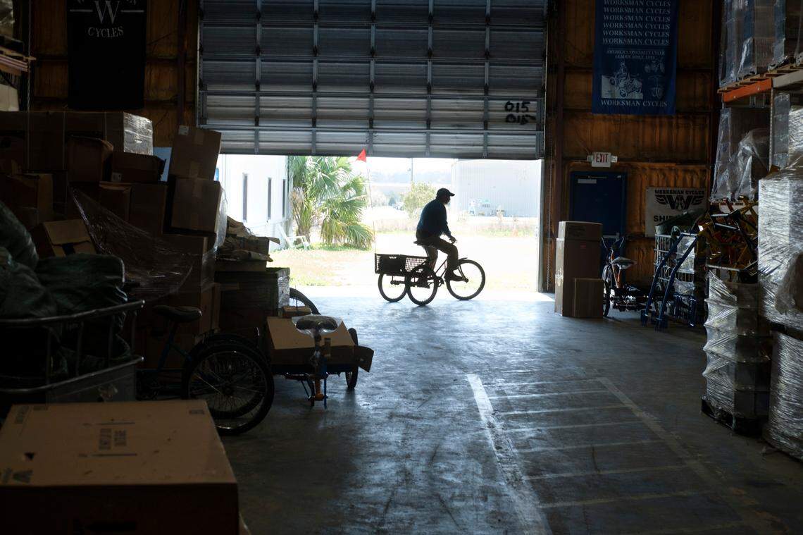 A factory worker uses a tricycle to move parts around Worksman Cycles in Conway, S.C. Factory operations moved from New York City to Conway, S.C. in 2016. March 7, 2023.