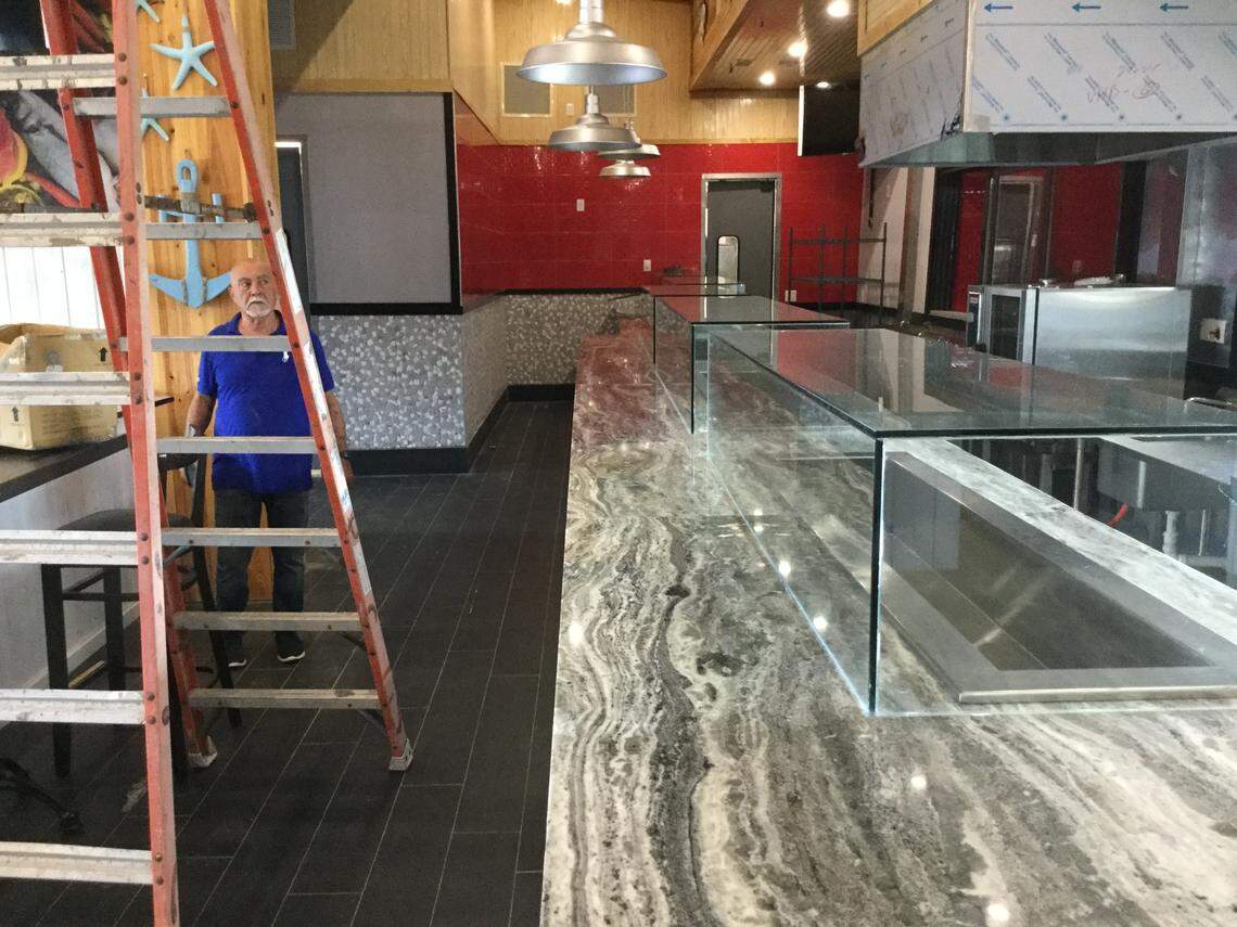 Owner Sam Lauren looks over the work being done at Clearwater Oyster Bar and Grill, which is expected to open in June on Restaurant Row in the Myrtle Beach area. It joins Soho, The Chophouse Prime Steakhouse and Burger Boys in a complex along the Intracoastal Waterway.