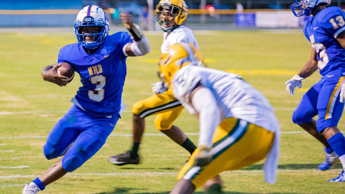 North Myrtle Beach senior quarterback Ramsey Lewis runs the ball against the Conway Tigers Friday night in Little River. The Chiefs defeated the Tigers 24-7 to move to 1-0 on the season.