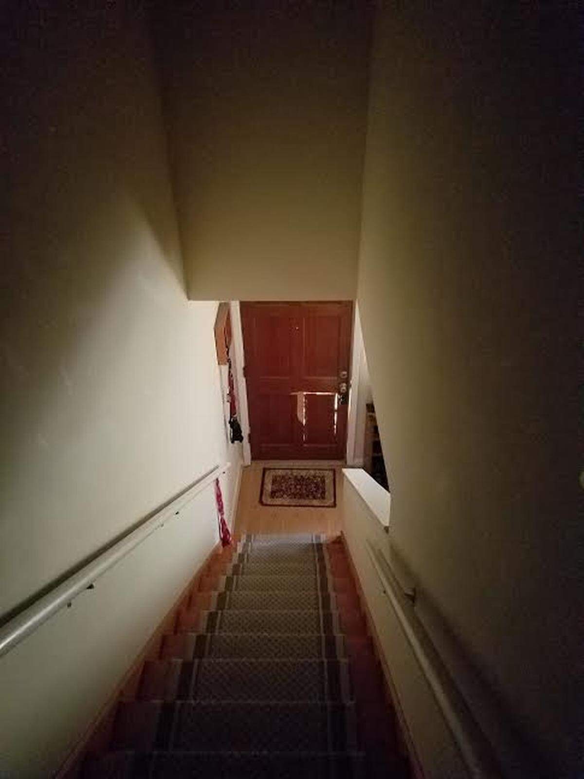A panel of the door is knocked out after police used a battering ram to force a door open at a 37th Avenue North home on July 25, 2018. The family that lived at the home said the police raided the residence, but the person they were looking for lived at another nearby apartment.