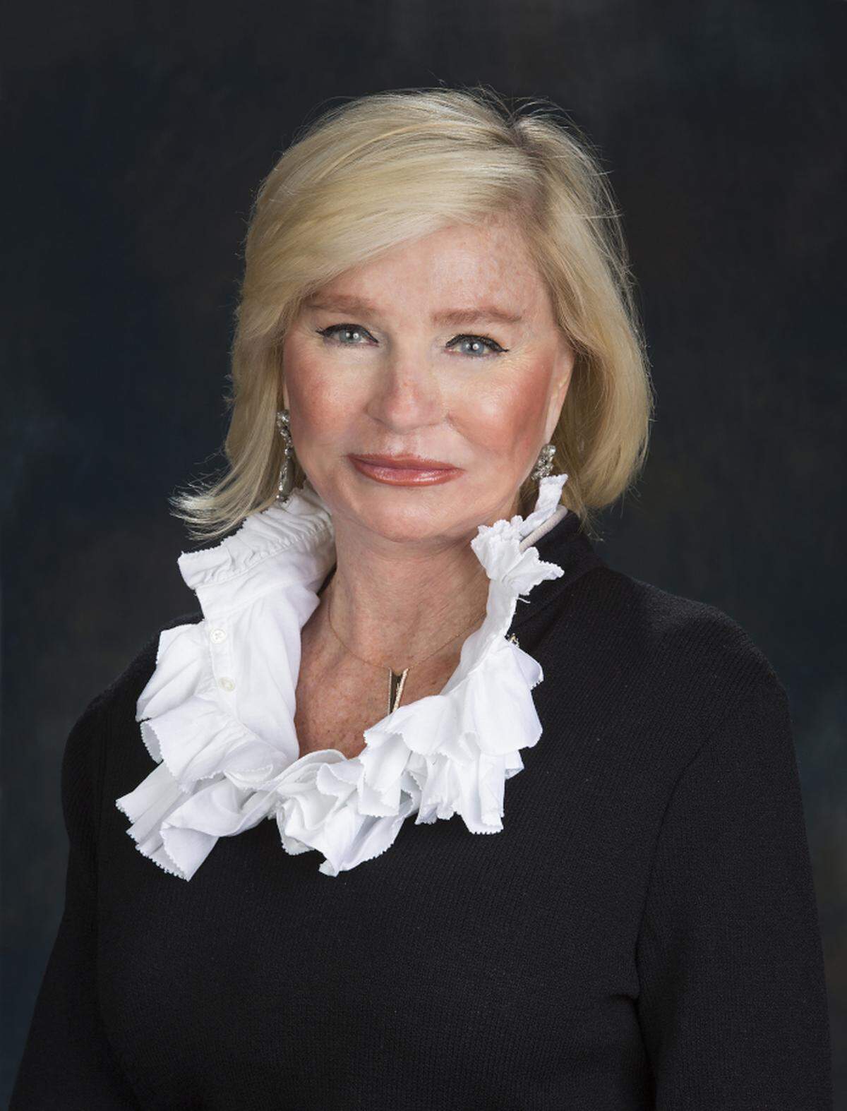 A professional headshot of Marilyn “Murph” Fore.