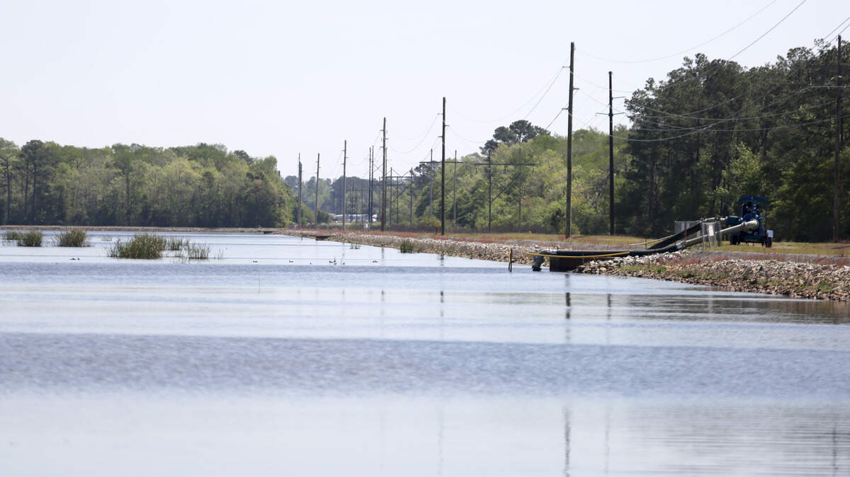 A pump sits waiting to begin draining Lake Busbee in Conway, S.C. The lake will be drained by Santee Cooper on Thursday, April 13 and the process will last approximately 30 days.