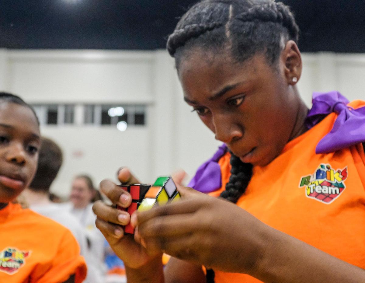 Caniyah Beaty, 11-years-old from South Conway Elementary, finishes the RubikÕs Cube Challenge in 1 minute and 23 seconds at Horry CountyÕs 10th Annual Technology Fair. The event was held at the Myrtle Beach Convention Center on Wednesday with over 700 entries from over 3,000 students in almost a dozen different categories covering all forms of technology. Apr 10, 2019.