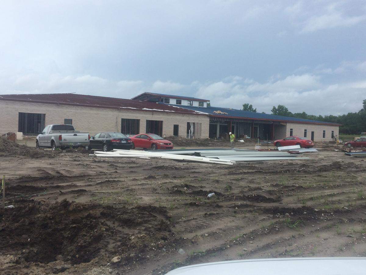 Crews work on the Palmetto Academy for Learning Motorsports’ new building on Monday, July 30, 2018. NASCAR champion Kyle  Busch will be there on August 7 for the grand opening.