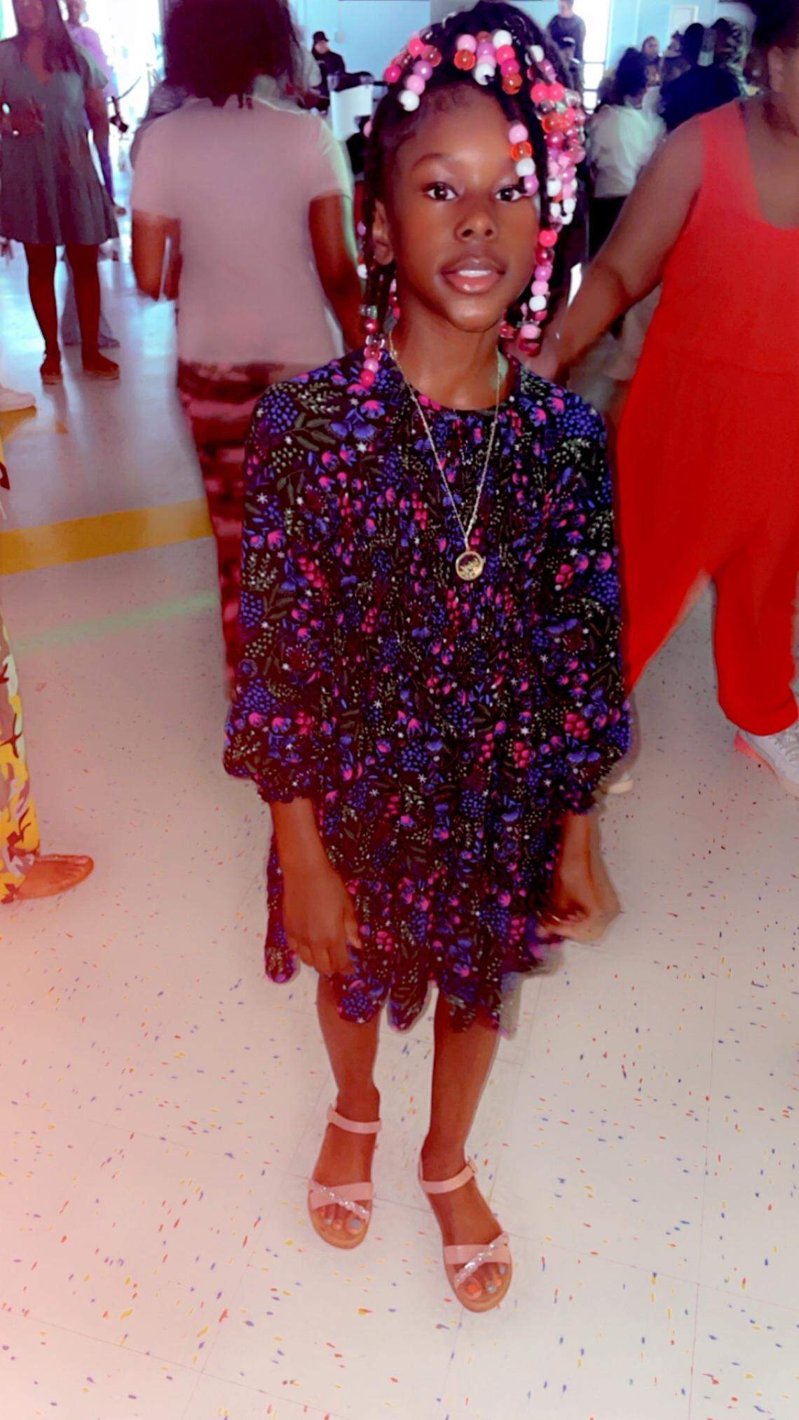 The daughter of Stephanie Floyd-McInnis who got her arm caught in a school bus door. The driver knew her arm was stuck and continued to back-up.