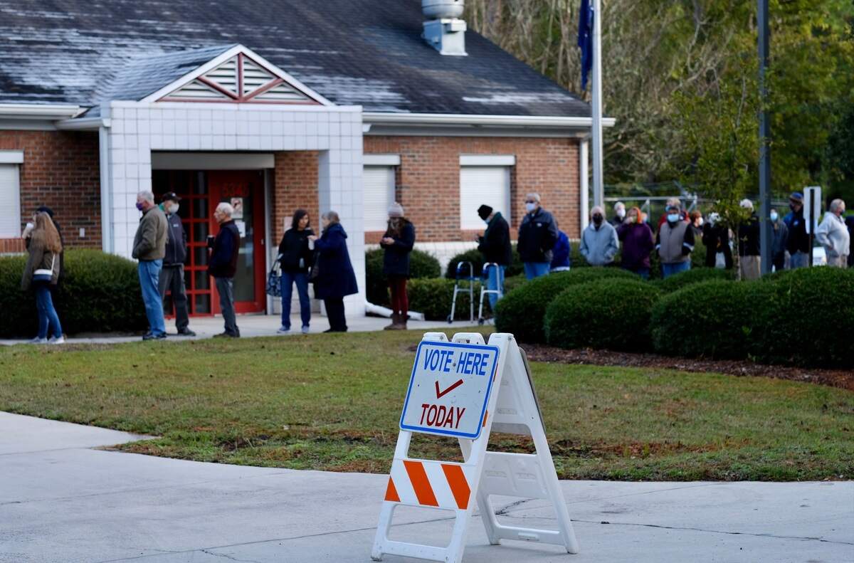 Voters formed a line as the polls opened at the fire station on Little River Neck Road North Myrtle Beach, S.C.