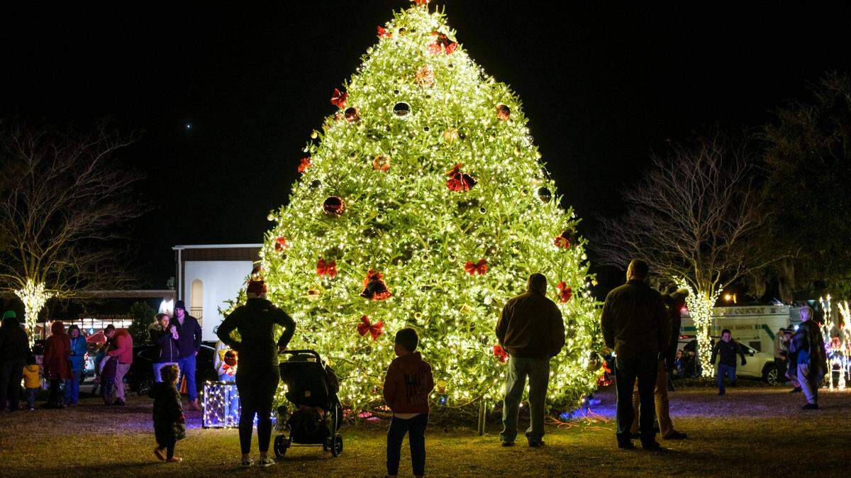 Conway S.C. held the annual "Living Window" displays amid holiday festivities that included camel and horse drawn carriage rides, and live entertainment Thursday night. The historic river town has become a holiday destination for locals and visitors. Dec. 9, 2021.