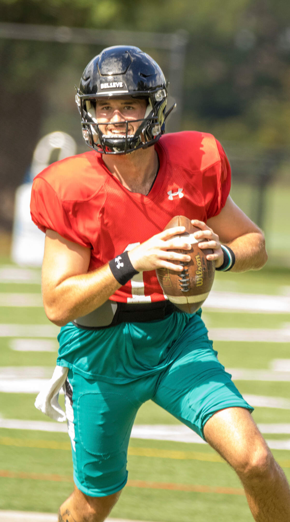 Coastal Carolina quarterback Grayson McCall runs through passing drills at Fowler Turf Field at Coastal Carolina University on Friday, August 26, 2022.