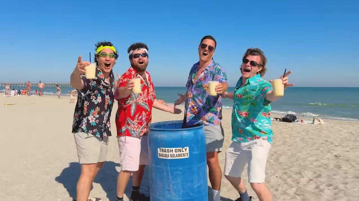 A screenshot from the “Myrtle Beach” Youtube video shows the comedians dancing on the beach.