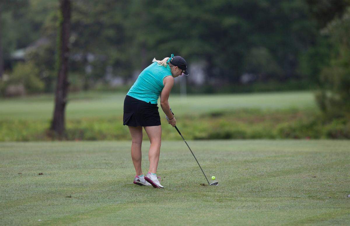 Juliana Sebastian of Columbia, S.C. tees off on the 9th hole during the final round of the Women’s Carolinas Amateur Championship at the Reserve Golf Club in Pawleys Island.