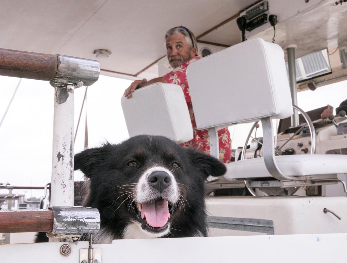 Tim Atkinson is riding out Hurricane Florence in his thirty six foot Hattaras boat in Doc Holiday’s Marina with his wife Judy and two dogs Douglas and Roxie. “I feel safer here than anywhere his wife Judy said, and our dogs are at home here.” Wednesday, September 10, 2018.