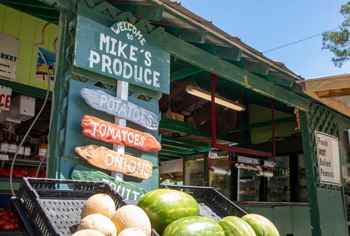 A sign hangs inside of Mike’s Produce & Seafood on Lake Arrowhead Road in Myrtle Beach.