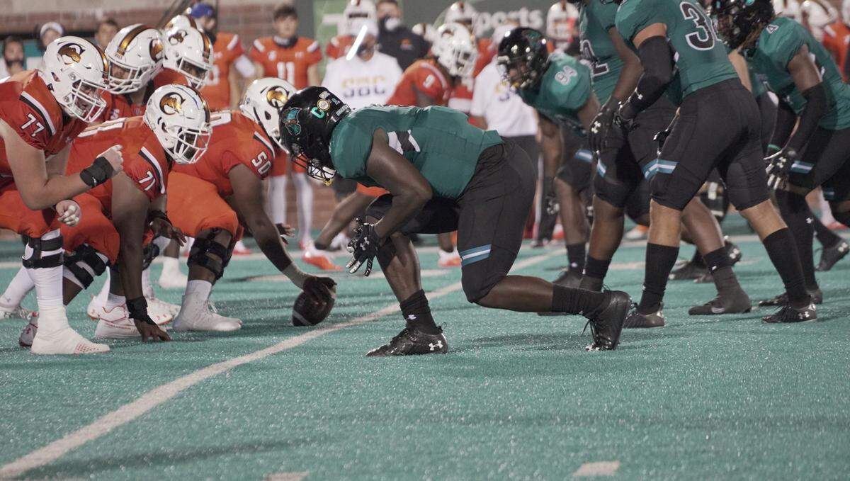 Coastal Carolina senior defensive end Tarron Jackson lines up against Campbell at Brooks Stadium on Sept. 18, 2020.