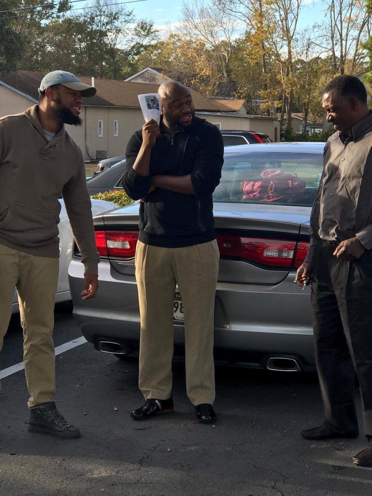 Darius Hemingway (center) shares a laugh. 