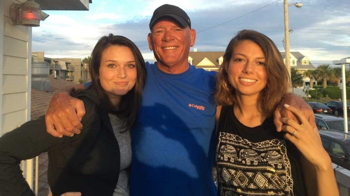 The late Capt. Harry Evans and his daughters Madi Luzzi of Spokane, Wash., (left) and Kate Evans of Murrells Inlet (right) at Marlin Quay Marina.