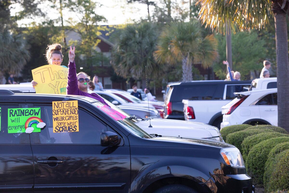 A prayer vigil for all the health care workers at Tidelands Waccamaw Community hospital was held in the parking lot by hundreds of members of Belin Memorial UMC and members of the Murrells Inlet community on Thursday evening. April 2, 2020.\. April 2, 2020