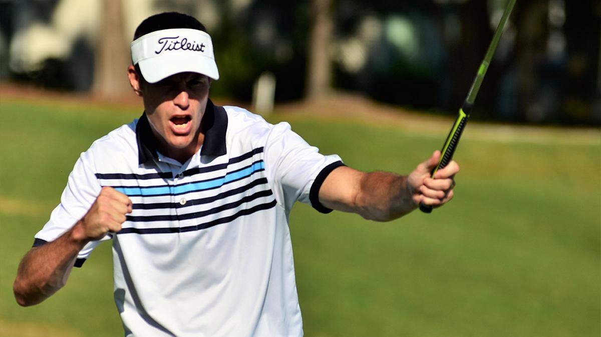 A World Am competitor celebrates a made putt.