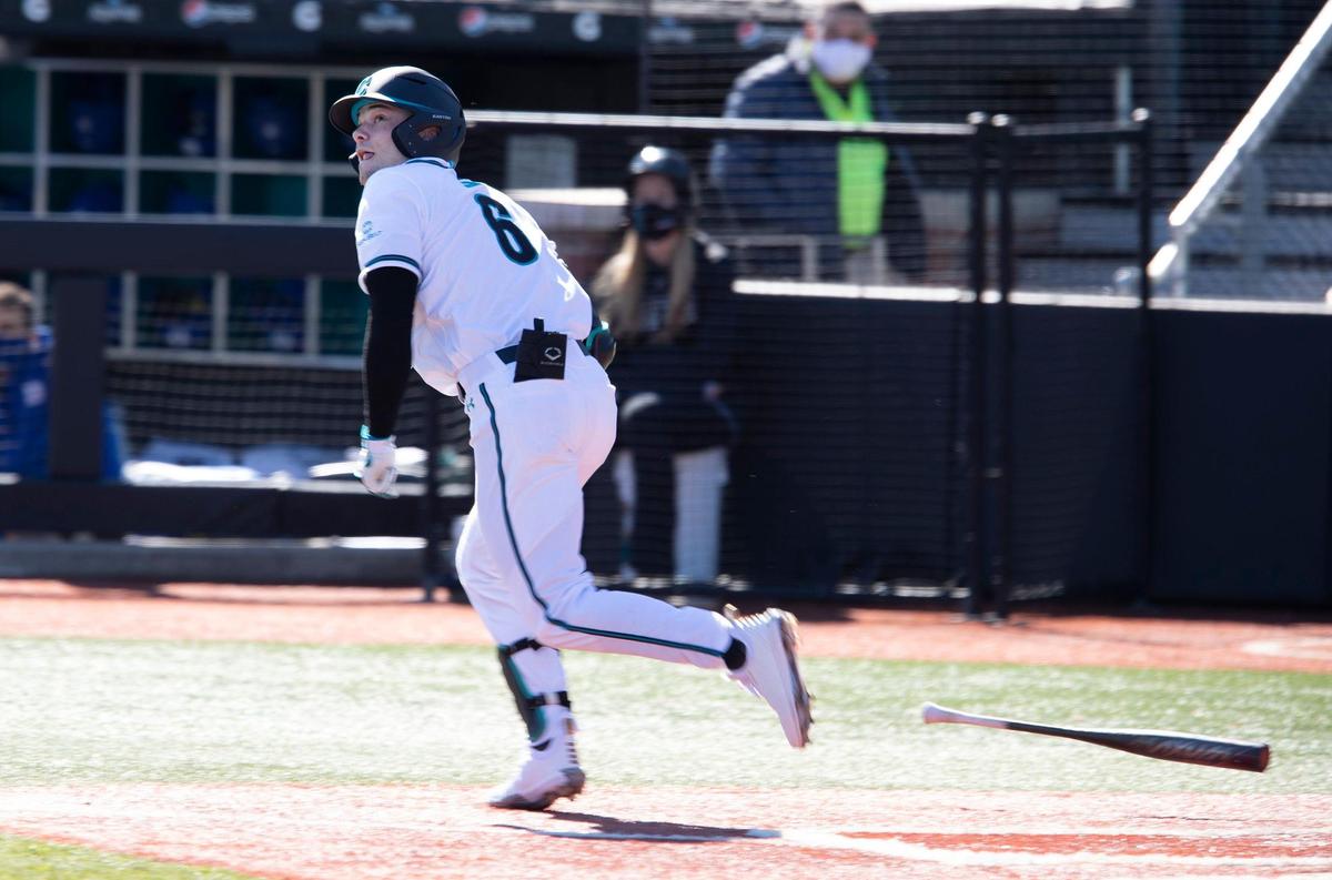 Coastal Carolina batter Nick Lucky (6) watches the ball after hitting a double against Duke Saturday at Springs Brooks Stadium in Conway.