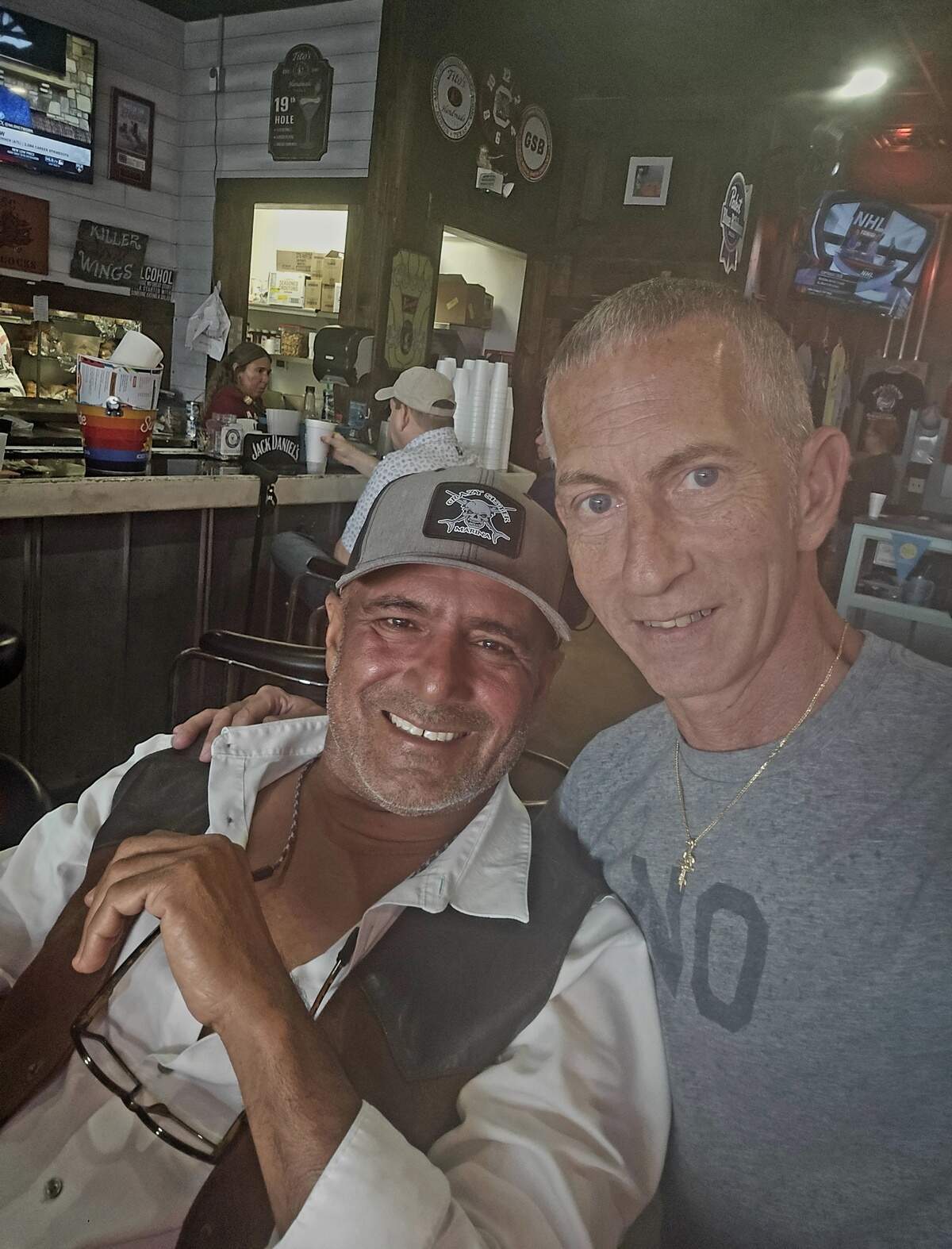 Al Almarzouqi and Adam Oppedisano pose for a photo together. Oppedisano knew Almarzouqi for more than 20 years.