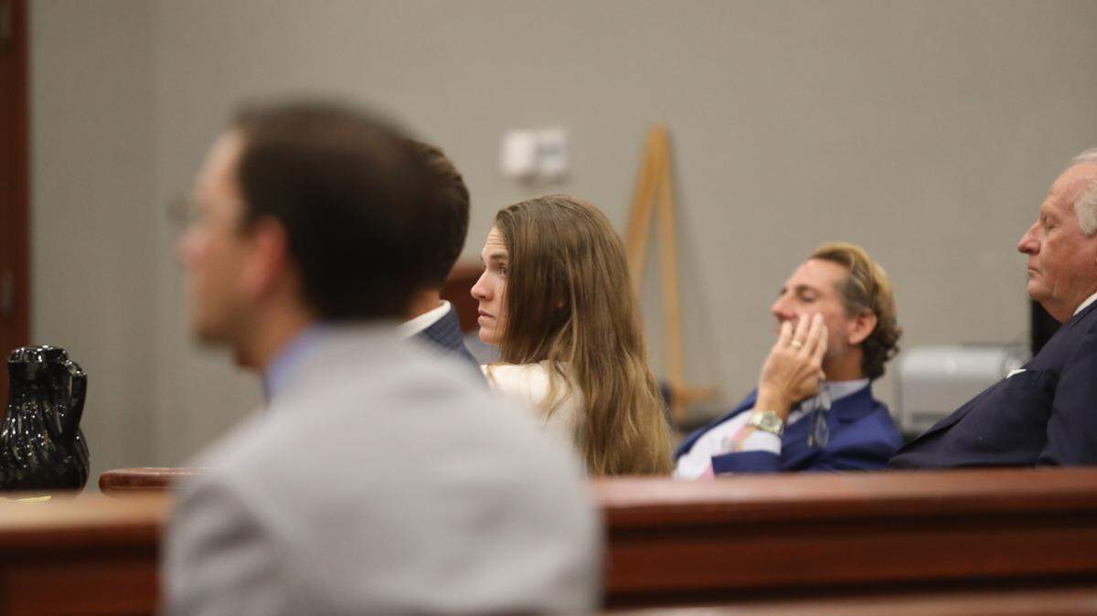 Meagan Jackson watches as lawyers argue her innocence in court. She has been accused or shooting and killing her ex-boyfriend, Greg Rice, with assistance from a county coroner. June 10, 2025