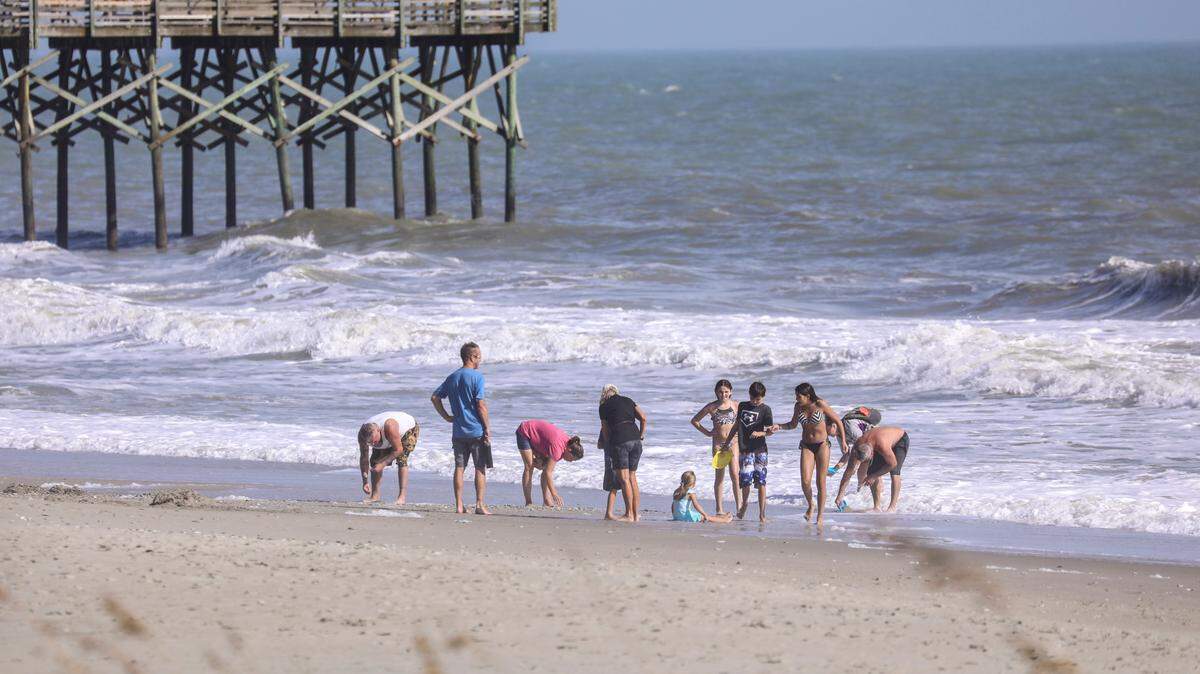 People enjoyed a beautiful warm and sunny Fall day along the Myrtle Beach area coast despite the predictions of dangerous conditions due to Hurricane Nicole. Though the storm battered Florida on Thursday and forecasters predicted coastal flooding and tornados for the Carolina’s, Myrtle Beach was largely spared the impacts of the sub-tropical system. November 11, 2022.